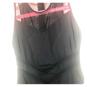 Black one piece bathing suit with mesh details